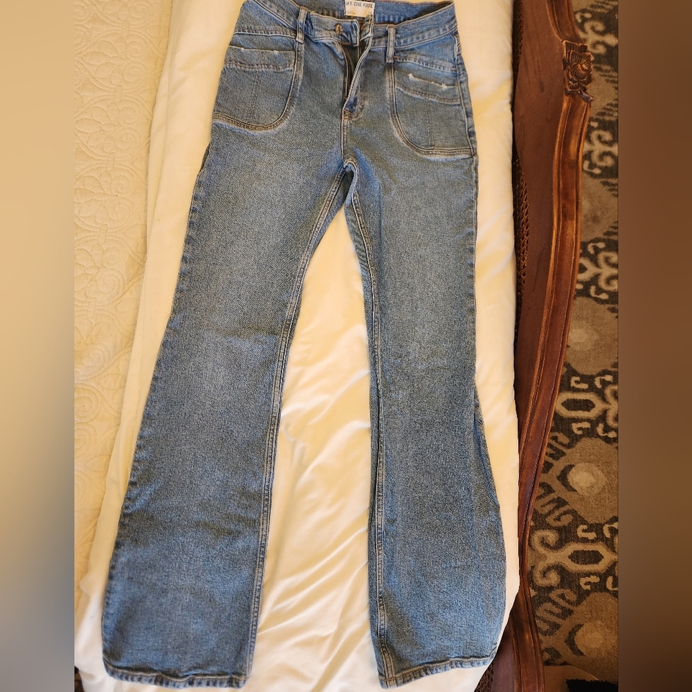 We The Free long flare mid rise jeans.